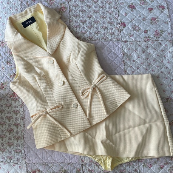 Cider Dresses & Skirts - Pastel yellow ribbon vest and skirt set